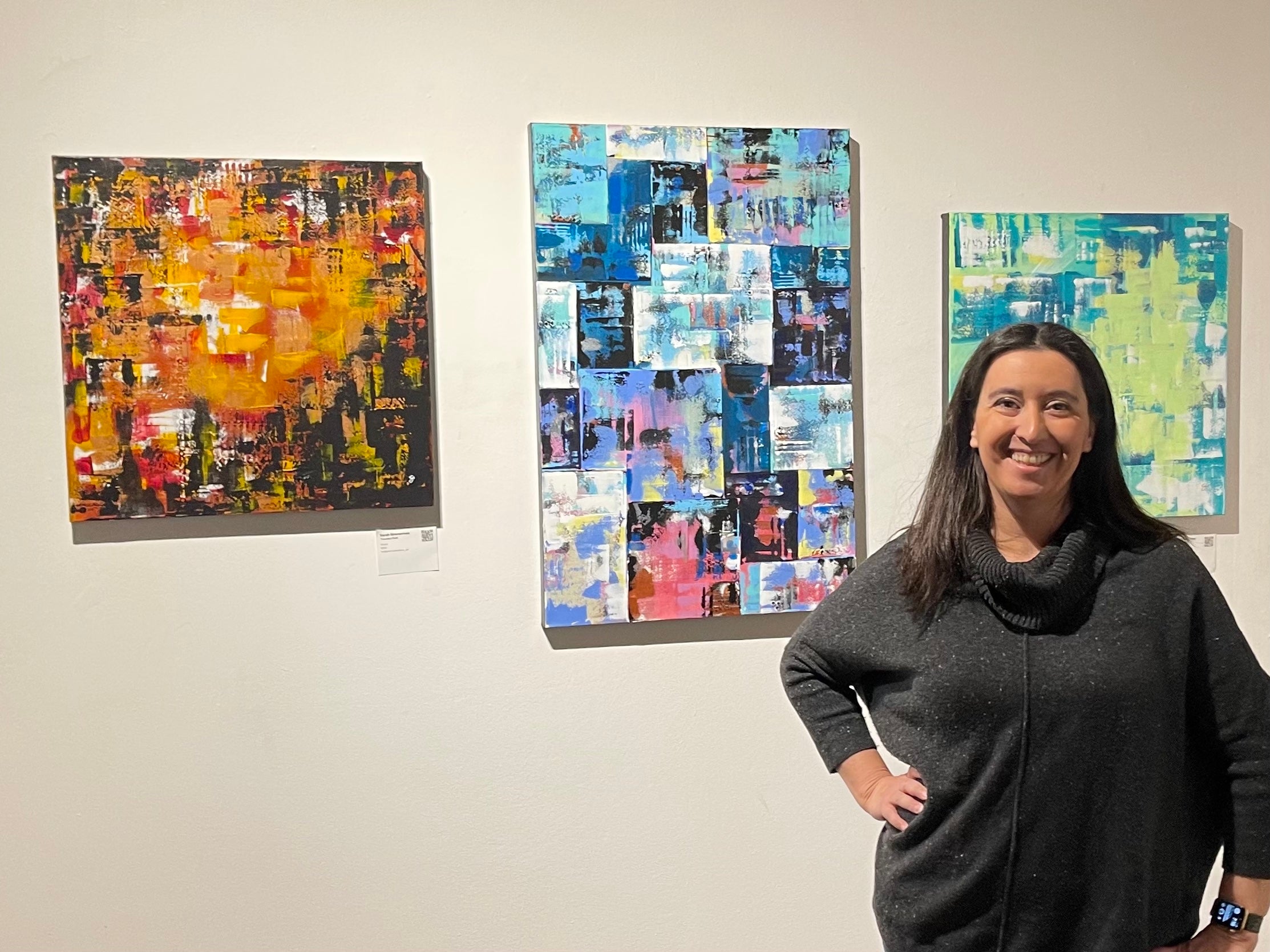 Sarah Simmerman with her work at the Becoming Exhibit at New City Studio in Phoenix AZ